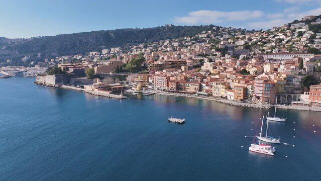 Drone flies around the Port de la Sant&eacute; of Villefranche-sur-mer, from right to left