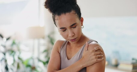 Woman, shoulder and massage for pain in home with tension, warm up or burnout for workout in lounge. Person, joint injury and muscle relief with fitness, exercise and overwork in living room of house