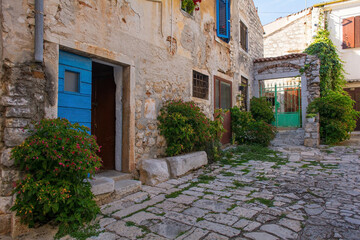 Fototapeta na wymiar A quiet back street in the historic centre of the medieval coastal town of Rovinj in Istria, Croatia