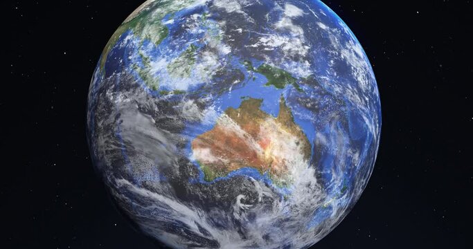 Viewed from space, a realistic 3D animation of Australia and the world turning into a dry, depleted and scorched barren desert. Global warming, drought, climate crisis and global catastrophe concept.