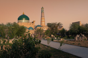 Fototapeta na wymiar Old city Ichan-Kala with Pahlavan Mahmoud Mausoleum dome and Islam Khoja Minaret, Khiva, Uzbekistan