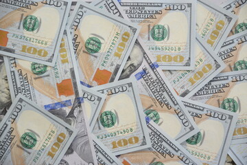 Fototapeta na wymiar Pile of new one hundred dollar bills