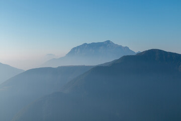 Fototapeta premium Spectacular mountain ranges silhouettes in morning.