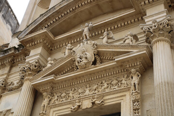 Church of Saint Mary of Grace facade closeup with details, Lecce, Italy.