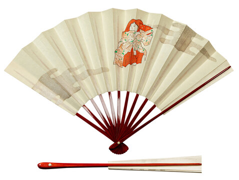 Japanese traditional vintage hand fan from paper and bamboo with red ornament, isolated on white