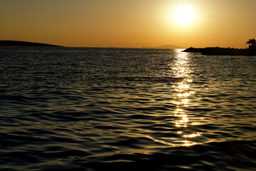 Dusky orange sunset on the Croatian sea coast