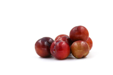 plums on a white background