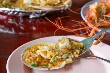 grilled scallops shell with butter and garlic.