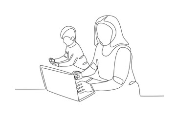 A woman works while caring for children