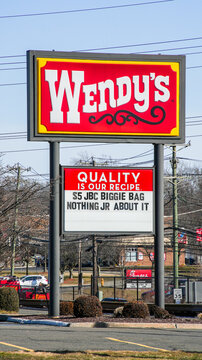 NORWALK, CT, USA - FEBRUARY 9, 2024:   Wendy's sign near Post road in Norwalk in nice sunny winter day