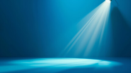 A spotlight with a cool blue hue highlighting a circular area.