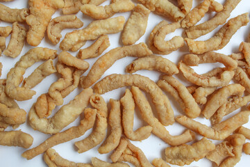 Crispy fried chicken intestines, as background, flat lay or top view