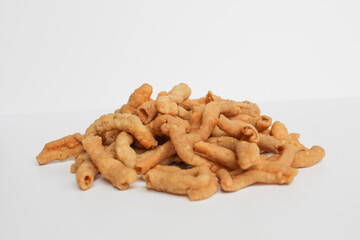 Crispy fried chicken intestines, isolated on white background
