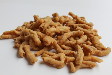 Crispy fried chicken intestines, isolated on white background