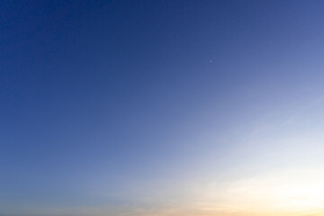 Beautiful morning or evening blue and orange sky taken at the sea used as natural blackground...