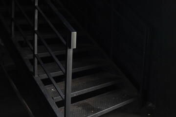 black iron stairs in the dark