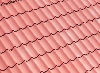 Metal tiles on the roof as an abstract background. Texture