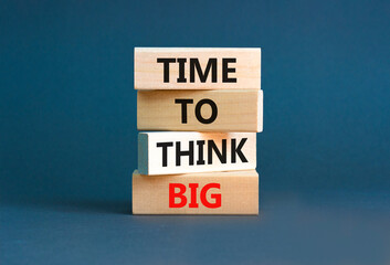 Time to think big symbol. Concept words Time to think big on beautiful wooden block. Beautiful grey table grey background. Business and time to think big concept. Copy space.