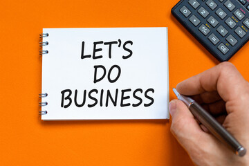 let is do business symbol. Concept words let is do business on beautiful white note. Beautiful...