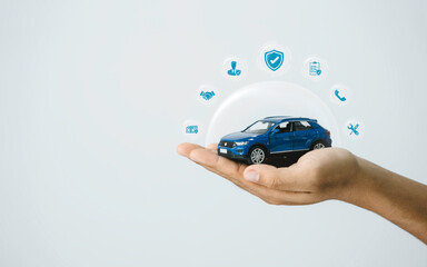 Car insurance, vehicle protection concept. Hand-protect blue toy car under a glass dome with icon...