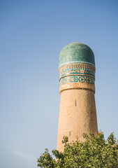 Exterior of Chor Minor Madrasah in the ancient city of Bukhara in Uzbekistan, oriental architecture...