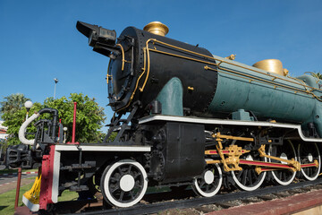 Fototapeta na wymiar Antique steam locomotive train in Korat or Nakhon Ratchasima