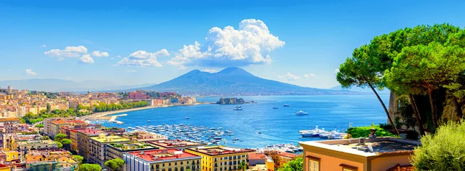 Gordijnen Naples, Italy. View of the Gulf of Naples from the Posillipo hill with Mount Vesuvius far in the background and some pine trees in foreground. Banner header horizontal image. 2021-08-31. © Alessandro