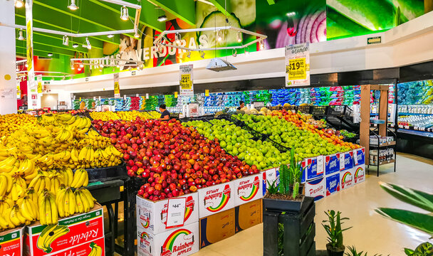 Supermarket from the inside Shelves Goods People Shopping carts Products.