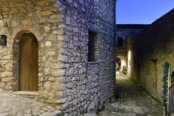 A narrow street in Riardo, a medieval village in Campania, Italy.