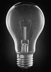Incandescent light bulb isolated on black background
