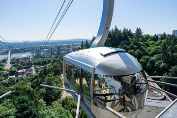 Fototapeta premium An Aerial Tram stopped at the upper station of the Portland Aerial Tram at the Oregon Health & Science University commonly referred to as OHSU.