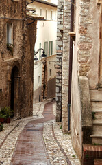 Fototapeta na wymiar A characteristic alley in the medieval village of Trevi