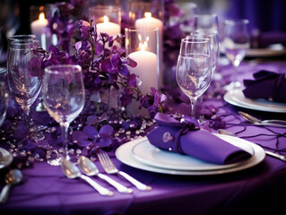 Obraz na płótnie Canvas table set at a party or wedding in purple 