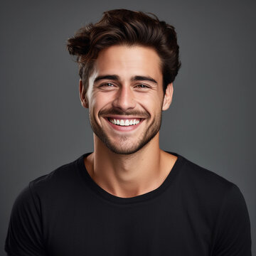 Young man with beautiful smile on grey background. Teeth whitening Job ID: cbc875be-60f7-4e85-8869-d76c0cfdab37
