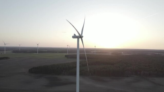 Wind turbine at sunset. West Pomerania, Poland