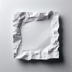 Crumpled white paper frame with a smooth center on a grey background, concept for text space.
