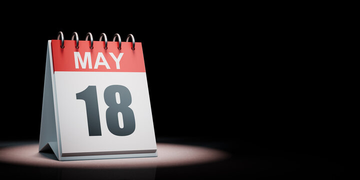 May 18 Calendar Spotlighted on Black Background