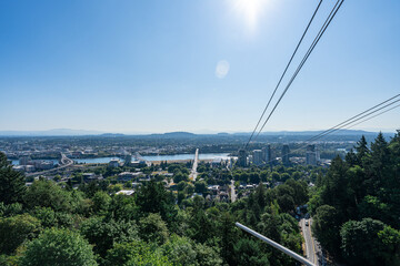 A photo of the Portland Skyline and Mt. Hood in the background on a clear sunny summer day as...