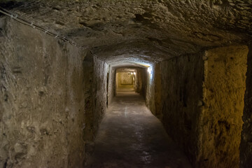 Fototapeta na wymiar Tunnel in the Catacombs of St. Paul in Rabat, Malta