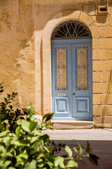 Fototapeta na wymiar Typical elegant Blue door in Maltese villages
