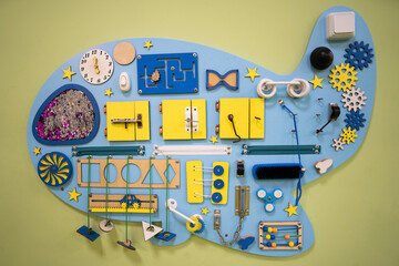 development board, busy board, for young children in a preschool institution
