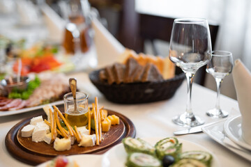 a lot of different food and snacks on the festive table