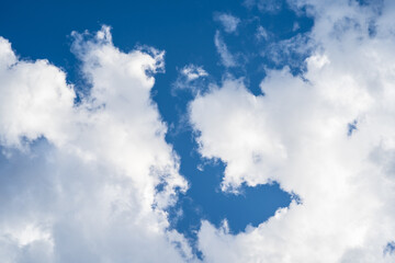 beautiful thick white clouds in the blue sky