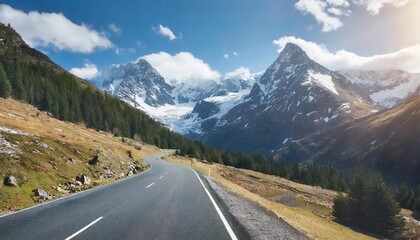 Fototapeta na wymiar road leading to a snowcapped mountain premium image