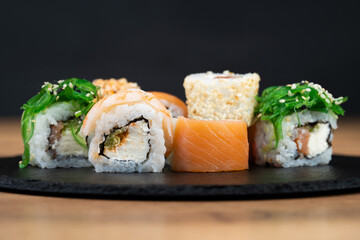 delicious traditional Japanese sushi and rolls on a plate