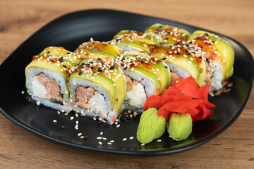 delicious traditional Japanese sushi and rolls on a plate