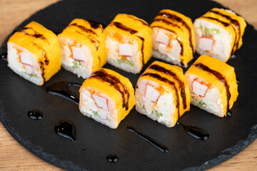 delicious traditional Japanese sushi and rolls on a plate