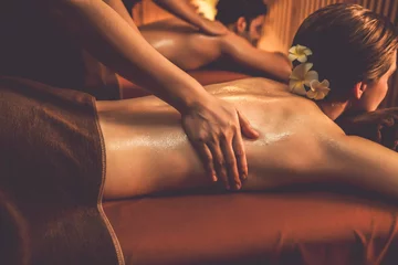 Poster Caucasian couple customer enjoying relaxing anti-stress spa massage and pampering with beauty skin recreation leisure in warm candle lighting ambient salon spa at luxury resort or hotel. Quiescent © Summit Art Creations