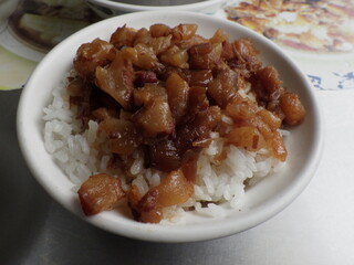 KAOHSIUNG, TAIWAN - January 1, 2024 :Chicken rice, pork rice, soup, and side dishes that I ate in Kaohsiung, Taiwan