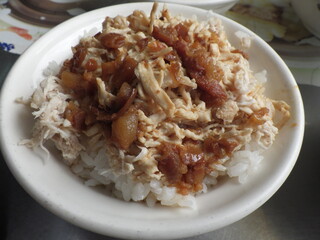 KAOHSIUNG, TAIWAN - January 1, 2024 :Chicken rice, pork rice, soup, and side dishes that I ate in Kaohsiung, Taiwan